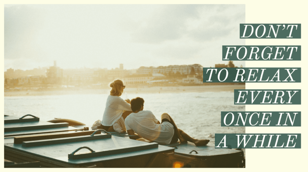 Two people sitting on a boat in the water.