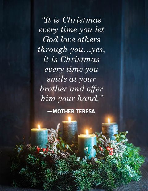 A christmas card with candles and mother teresa quote.